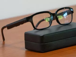 A pair of AR glasses sitting on a desk.  